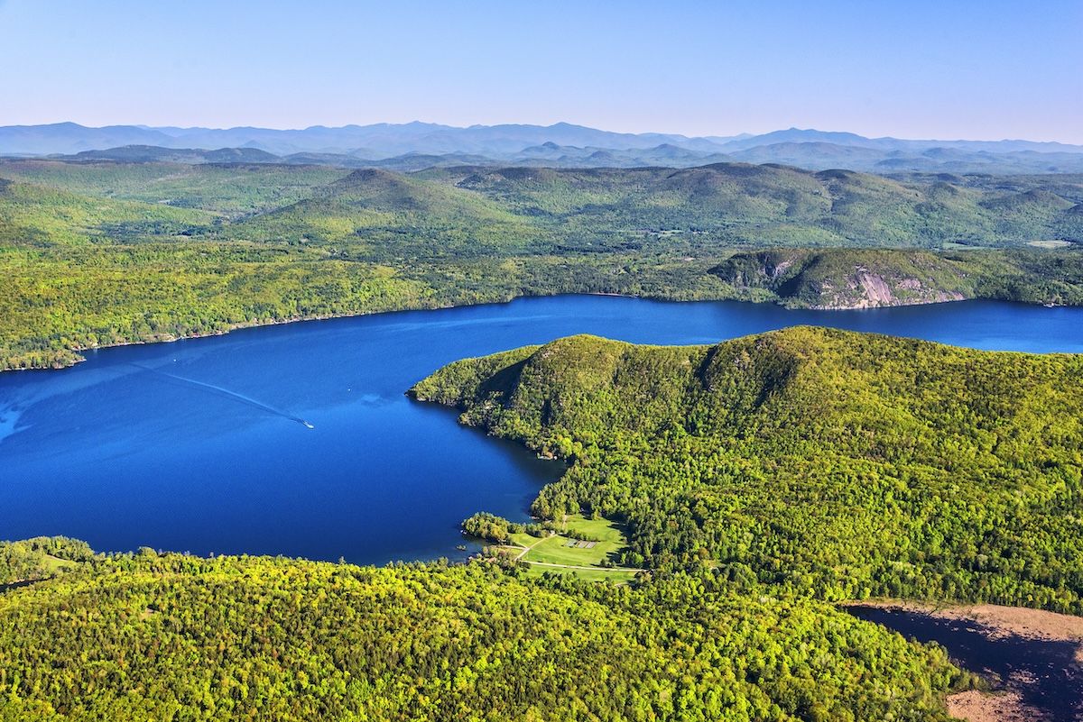 Photo by Carl Heilman, II/Wild Visions, Inc.: The LGLC has purchased 93 acres of land in Glenburnie that protects water quality and connects Anthony’s Nose (center) to the Sucker Brook Preserve (foreground).